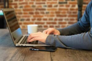 Young man follows elearning training.