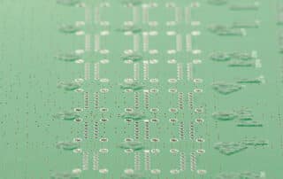 Electronics PCB with green peelable solder mask selective focus